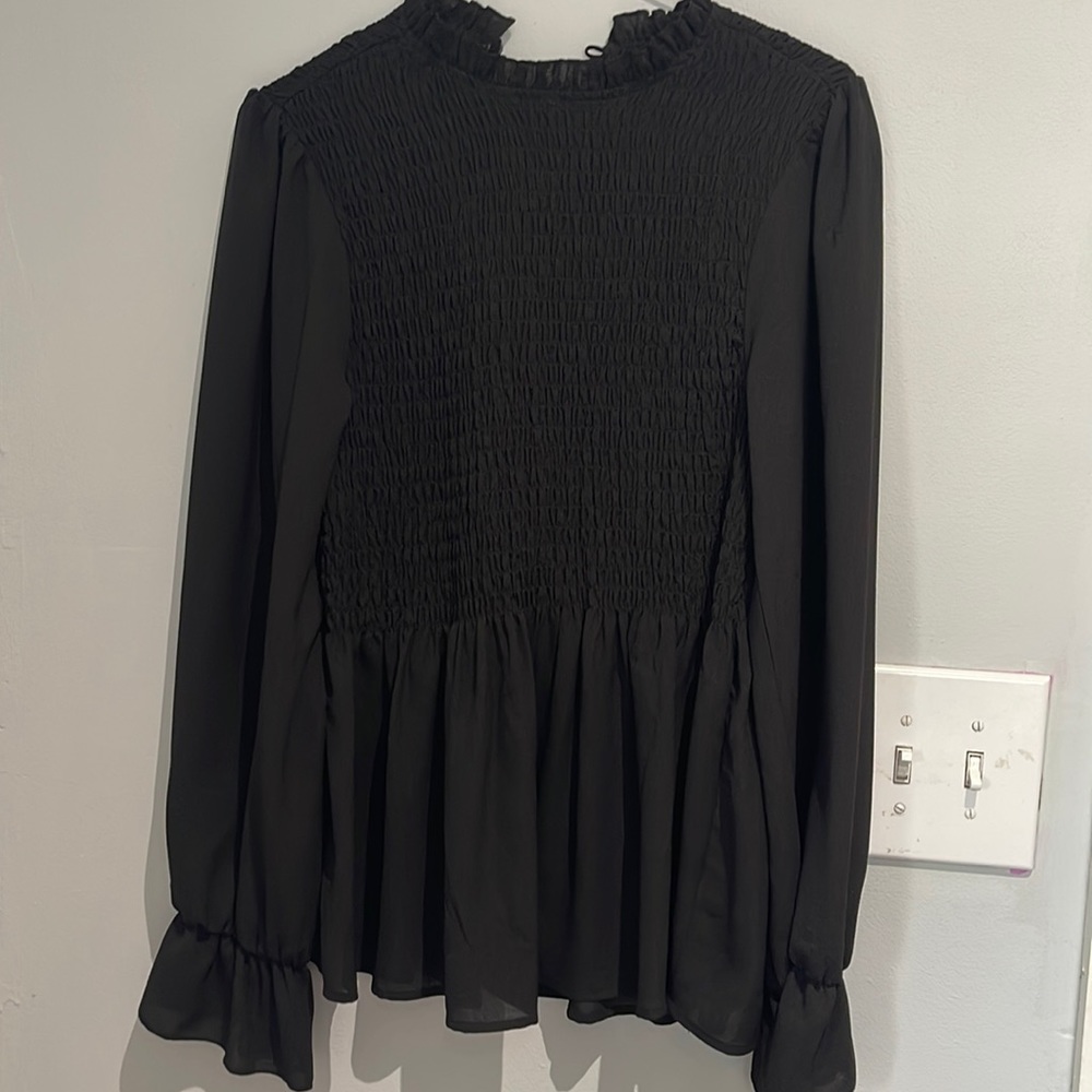 Black long sleeve ruffle top